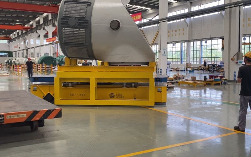 無軌電動平車在工業(yè)中轉(zhuǎn)運重型設備和工件的應用